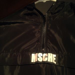 Black MSCHF. Rain jacket